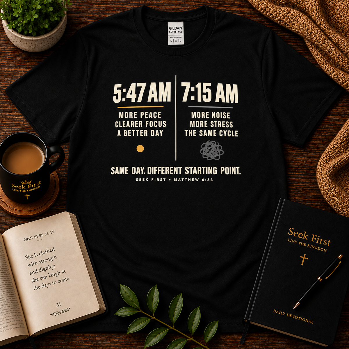 Black 5:47 AM vs 7:15 AM Christian T-shirt on a dark devotional flat lay