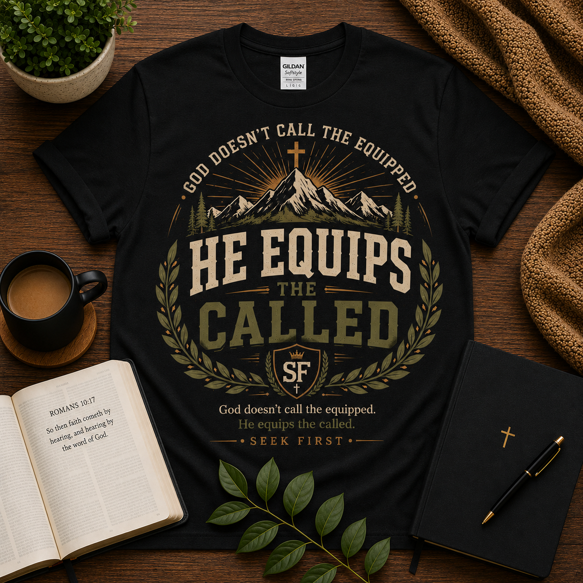 He Equips the Called Christian T-Shirt on black Gildan 64000 — Seek First hero image