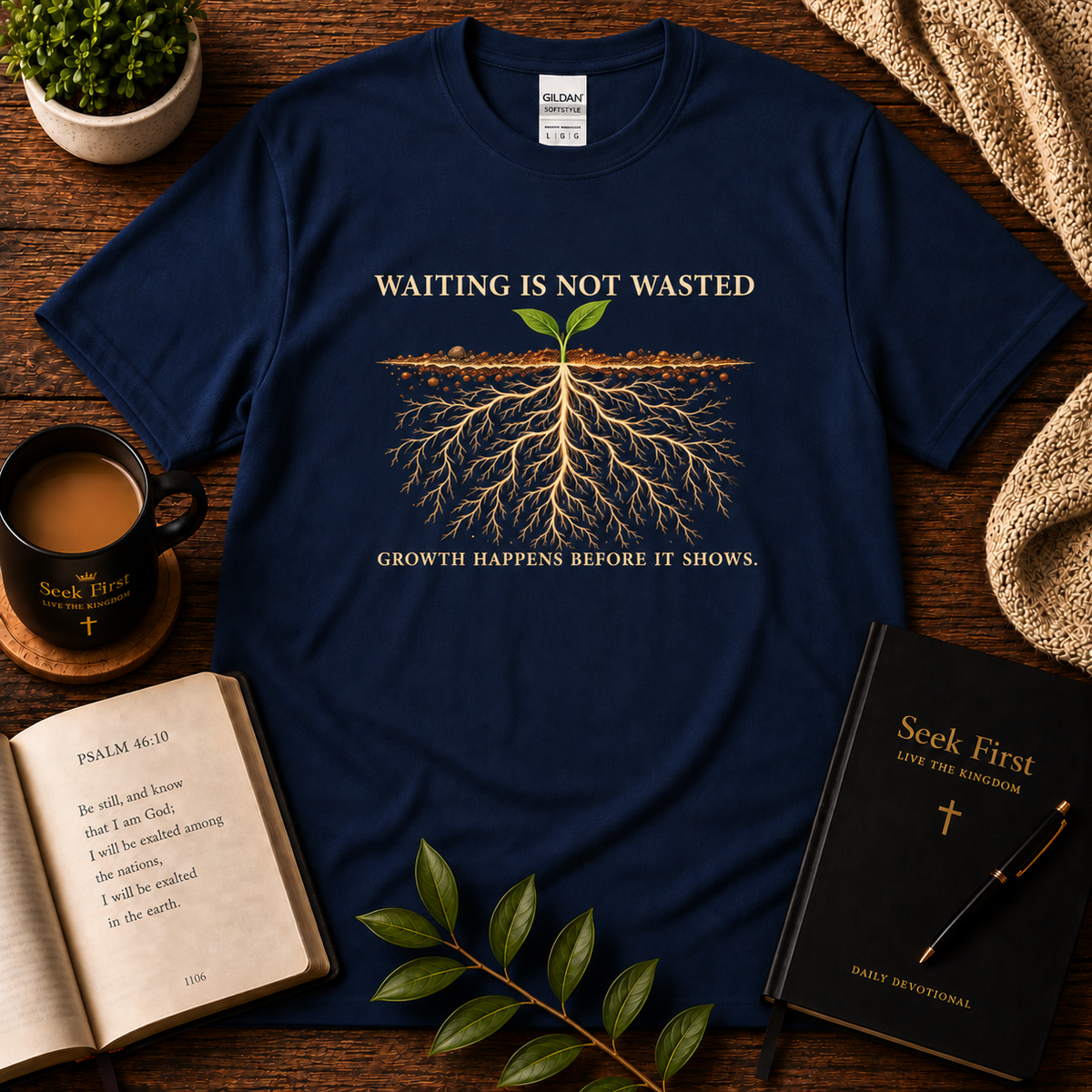 Navy Waiting Is Not Wasted Christian T-Shirt displayed with Bible, devotional, mug, and greenery